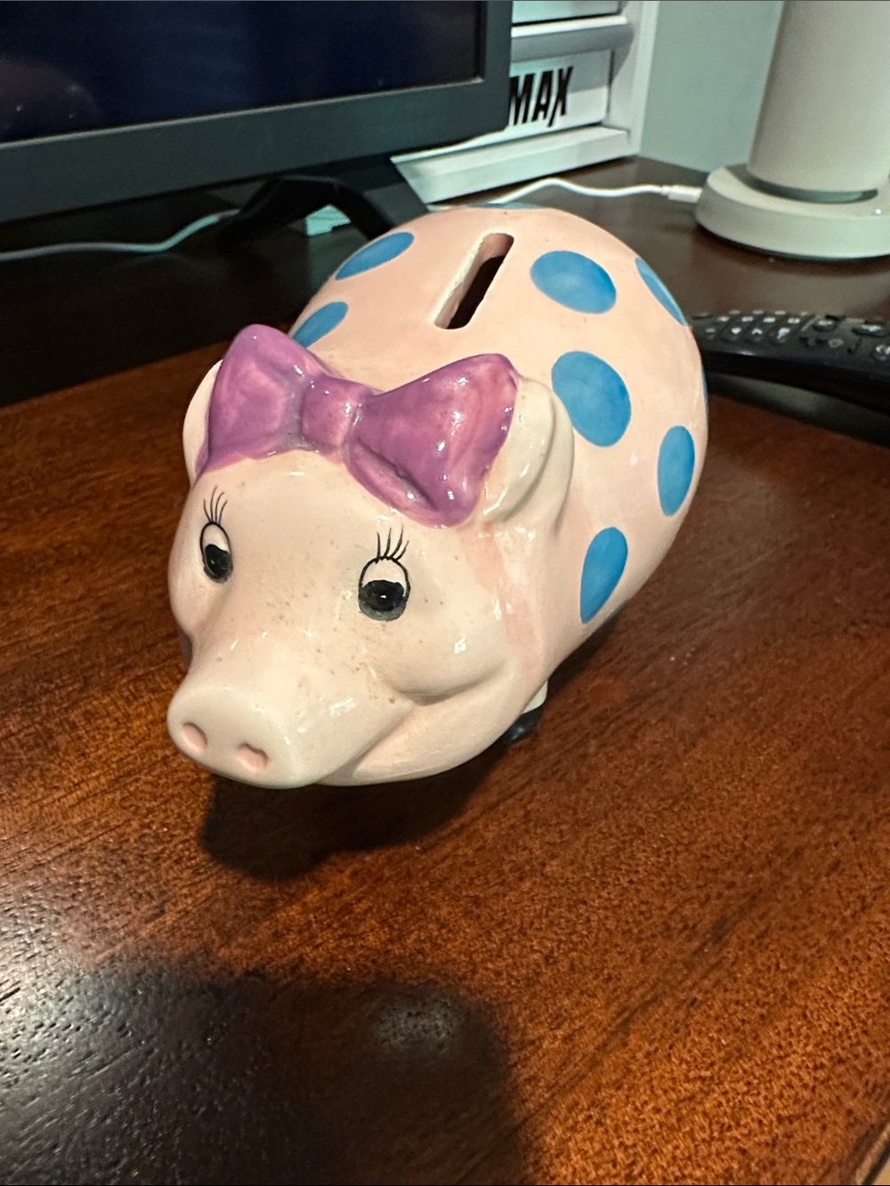 Pink Piggy Bank with Blue Polka Dots and Purple Bow